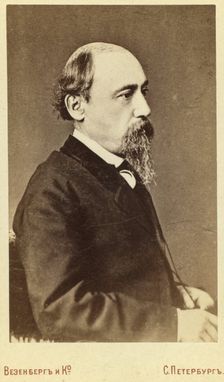 Nikolay Alexeyevich Nekrasov, half-length portrait, facing right, between 1880 and 1886. Creator: Unknown