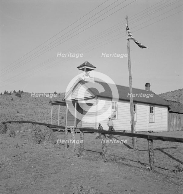 Nine a.m., four pupils attend this day, of the seven...eastern Oregon county school, 1939. Creator: Dorothea Lange.