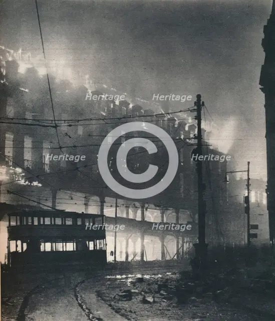 'Nine Hours of Bombing. When Sheffield's turn came it was mid-winter'. 1940 (1942). Artist: Unknown.