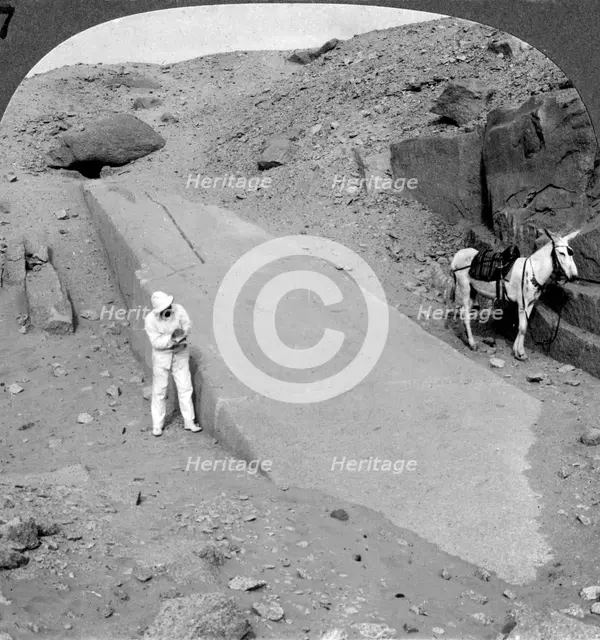 'Ninety-two foot obelisk still lying in the quarry of Assuan (Aswan), Egypt', 1905.Artist: Underwood & Underwood