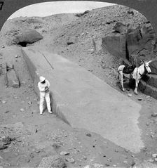 Ninety-two foot obelisk still lying in the quarry of Assuan (Aswan), Egypt 1905.Artist: Underwood & Underwood