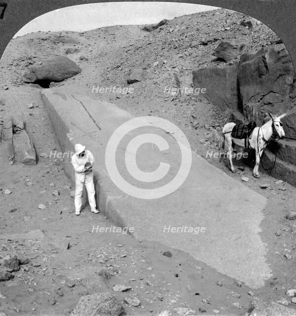 'Ninety-two foot obelisk still lying in the quarry of Assuan (Aswan), Egypt', 1905.Artist: Underwood & Underwood