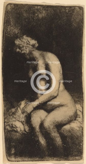 Nude Seated on a Bench with a Pillow (Woman Bathing Her Feet at a Brook), 1658. Creator: Rembrandt Harmensz van Rijn.