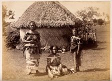 Nuku'alofa, Tonga: three Tongan women in front of a traditional hut, c1870s. Creator: Burton Brothers