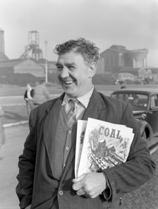 NUM official selling "Coal" magazine, South Yorkshire, 1959. Creator: Michael Walters