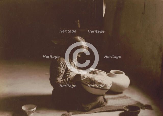 Nunipayo [i.e. Nampeyo] decorating pottery, c1900. Creator: Edward Sheriff Curtis.