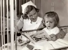 Nurse and her young patient at a children's hospital, Stockholm, Sweden, 1940s. Creator: Karl Sandels