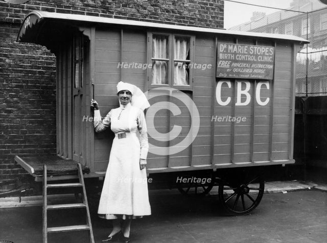 Nurse outside a Marie Stopes mobile birth control clinic, London, 1928. Creator: Unknown.