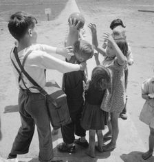 Nursery school, showing migrant children playing, FSA camp, Tulare County, CA , 1939. Creator: Dorothea Lange