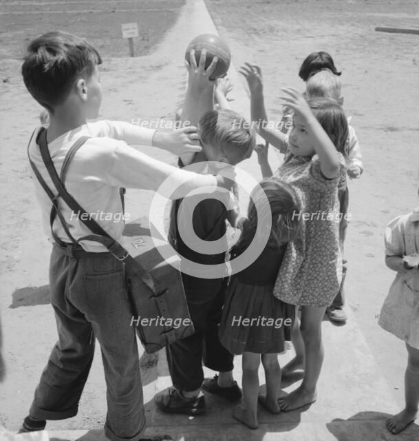 Nursery school, showing migrant children playing, FSA camp, Tulare County, CA , 1939. Creator: Dorothea Lange.