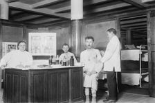 N.Y. City lodging house - vaccinating, 1914. Creator: Bain News Service