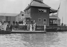 N.Y. Yacht Club Landing - Newport J.J. Astor & party, between c1910 and c1915. Creator: Bain News Service