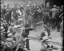 Small Crowd of American Civilians on a Demonstration/Strike in Conflict with the Police, 1930. Creator: British Pathe Ltd