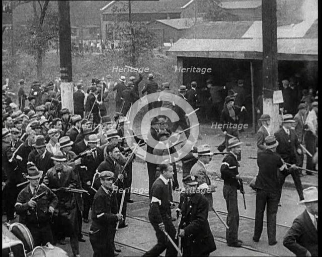Small Crowd of American Civilians on a Demonstration/Strike in Conflict with the Police, 1930. Creator: British Pathe Ltd.