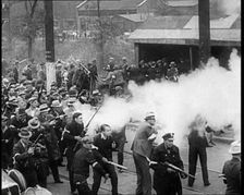 Small Crowd of American Civilians on a Demonstration/Strike in Conflict with the Police..., 1930. Creator: British Pathe Ltd