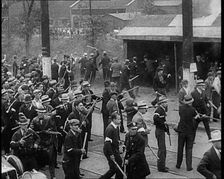 Small Crowd of American Civilians on a Demonstration/Strike in Conflict with the Police, 1930. Creator: British Pathe Ltd