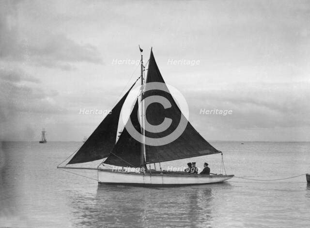 Small cutter sailing,1912. Creator: Kirk & Sons of Cowes.