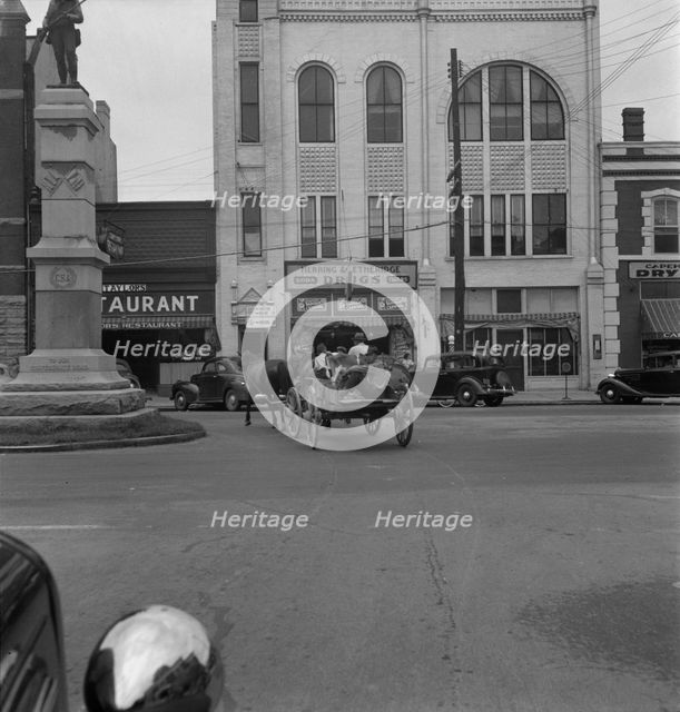 Small agricultural center, Oxford, North Carolina, 1939. Creator: Dorothea Lange.