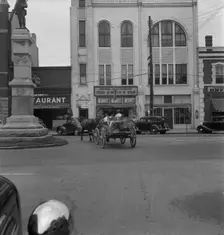 Small agricultural center, Oxford, North Carolina, 1939. Creator: Dorothea Lange