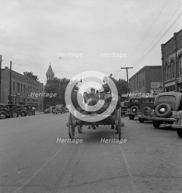 Small agricultural center, Oxford, North Carolina, 1939. Creator: Dorothea Lange.