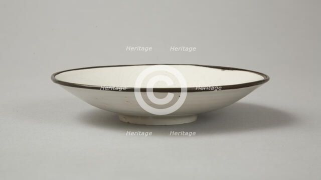 Small Ding-type bowl with incised peony scroll and dragon, 20th century. Artist: Unknown.