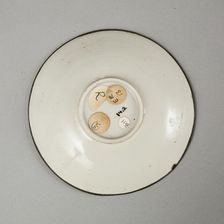 Small Ding-type bowl with incised peony scroll and dragon, 20th century