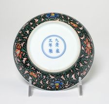 Small Saucer with Red, Blue, Green, Yellow Scroll of..., Qing dynasty, Yongzheng reign (1723-1735). Creator: Unknown