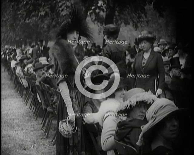 Smartly Dressed Civilians Sitting in Chairs , 1924. Creator: British Pathe Ltd.