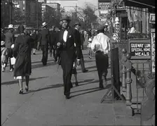 Smartly Dressed People Walking Along the Streets of New York City, 1932. Creator: British Pathe Ltd
