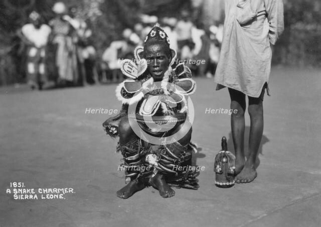 Snake charmer, Sierra Leone, 20th century. Artist: Unknown
