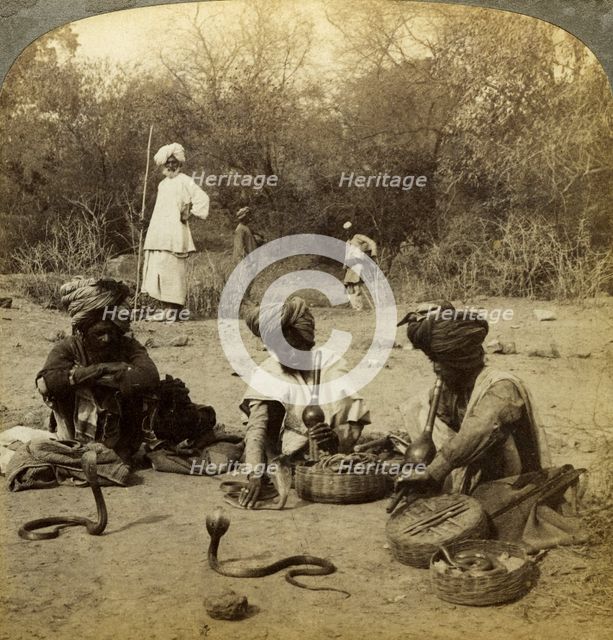 Snake charmers, Delhi, India.Artist: Underwood & Underwood