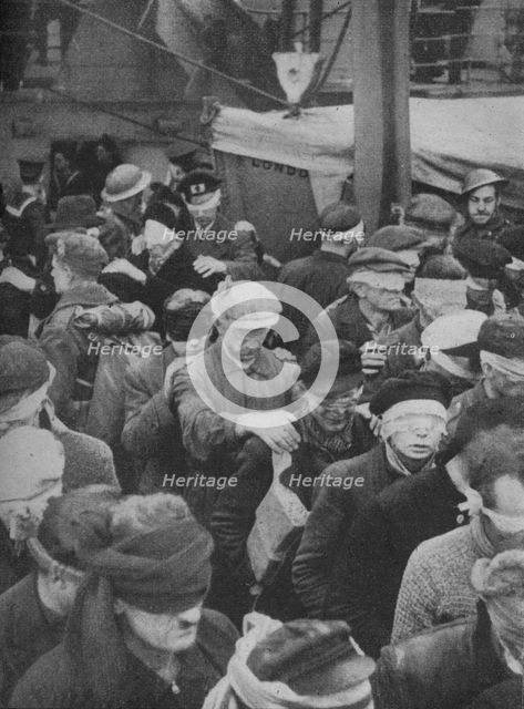 'Snatched from Norway, the Prisoners Come Aboard', 1941.  Artist: Unknown.