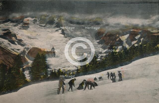 'Snowballing in Paradise Valley in Midsummer, Mt. Rainier National Park', c1916. Artist: Asahel Curtis.