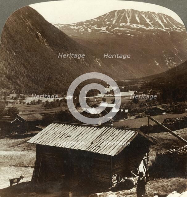 'Snowy heights of Mt. Gausta (6180 ft.), above quiet homes in Maan Valley, Norway', c1905. Creator: Unknown.