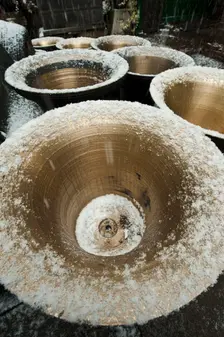 Snow on bells in the courtyard, Whitechapel Bell Foundry, Tower Hamlets, London, 2010. Artist: Derek Kendall