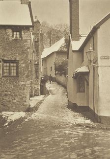 [Snow on roofs, alleyway]. From the album: Photograph album - England, 1920s. Creator: Harry Moult