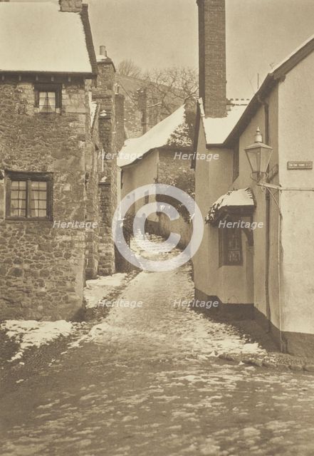 [Snow on roofs, alleyway]. From the album: Photograph album - England, 1920s. Creator: Harry Moult.