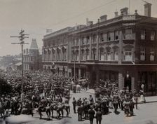 South Africa: a crowd of people gathered outside The Goldfields offices in Johannesburg, 1896. Creator: Unknown