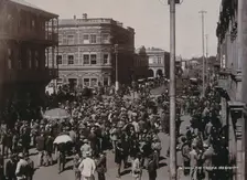 South Africa: a crowd of people gathered for trading in a chained off area outside the..., 1896. Creator: Barnett