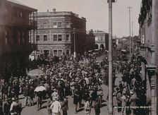South Africa: a crowd of people gathered for trading in a chained off area outside the..., 1896. Creator: Barnett