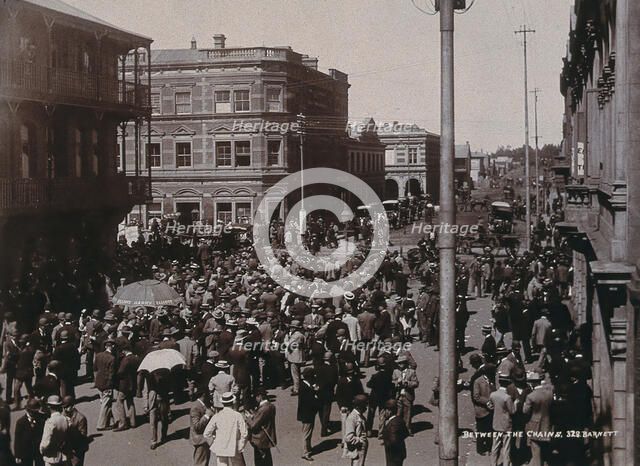 South Africa: a crowd of people gathered for trading in a chained off area outside the..., 1896. Creator: Barnett.