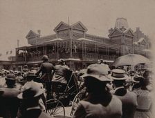 South Africa: a large crowd of people gathered outside a building in Johannesburg, 1896. Creator: Unknown