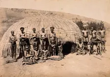 South Africa: Africans in front of a traditional kraal hut, between 1800 and 1899. Creator: Unknown