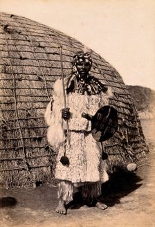 South Africa: an African chief in a dress of angora goatskin, 19th century. Creator: Unknown