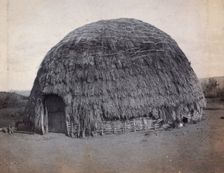 South Africa: an African kraal hut, 1905. Creator: Charles H Simpson
