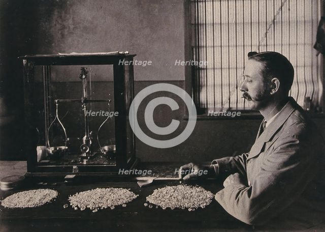 South Africa: an employee of De Beers counting the diamonds mined that day, 1896. Creator: Unknown.