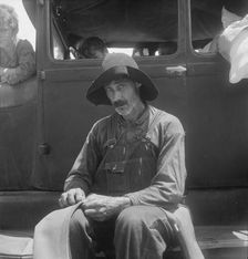 South Georgia tobacco sharecropper during the tobacco auction, Douglas, Georgia, 1938. Creator: Dorothea Lange