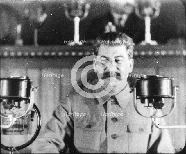 Soviet leader Josef Stalin giving a speech at the Congress of the Communist Party, 1930s. Artist: Unknown