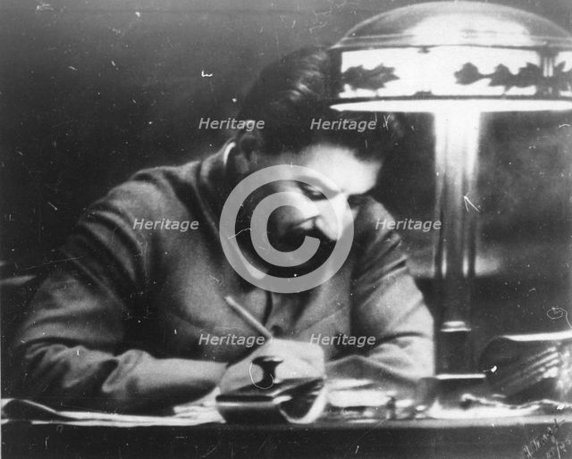 Soviet leader Josef Stalin in his Kremlin study, Moscow, USSR, 1935. Artist: Unknown