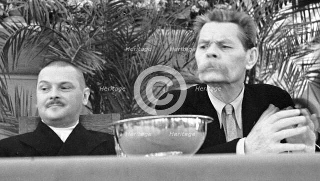 Soviet politician Andrei Zhdanov and Russian author Maxim Gorky, 1934. Artist: Anon